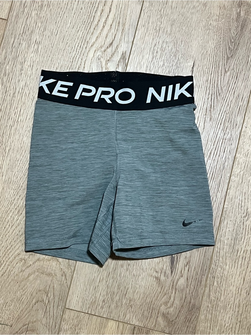 Nike Pro Women's Heather Gray Athletic Shorts with Black Waistband and sports br